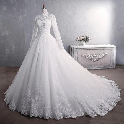 Elegant Long Sleeve Lace Bridal Gown With Train