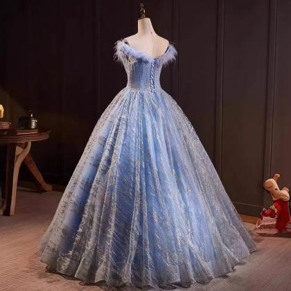 Elegant Feather Trimmed Tulle Ball Gown In Blue