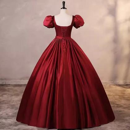 Elegant Red Satin Gown With Puffed Sleeves And..