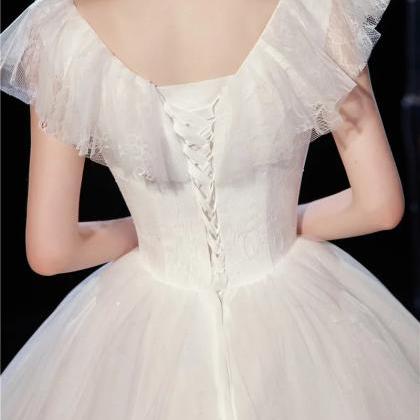 Elegant Cap Sleeve Embroidered Ball Gown Wedding..