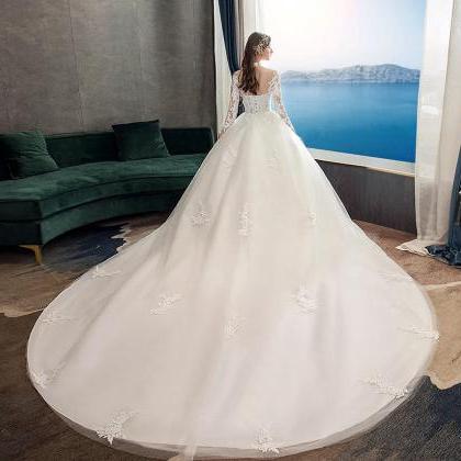 Elegant Long-sleeve Lace Applique Bridal Ball Gown