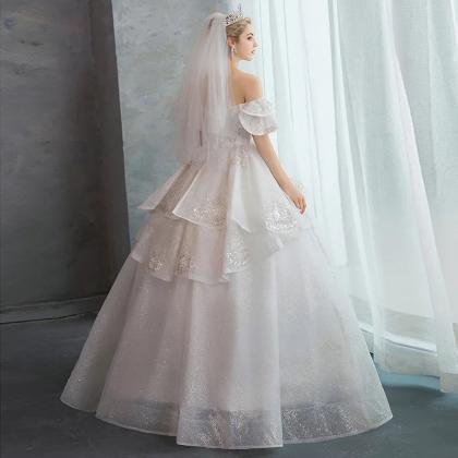 Elegant Layered Tulle Bridal Gown With Floral..