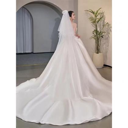 Elegant Strapless Satin Bridal Gown With Long Veil