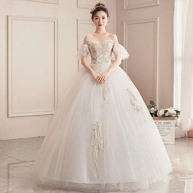 Luxury Off-Shoulder Beading Bridal Gown with Romantic Sleeves and Flowing Skirt