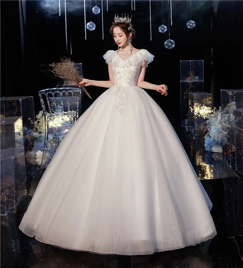 Elegant Cap Sleeve Embroidered Ball Gown Wedding Dress