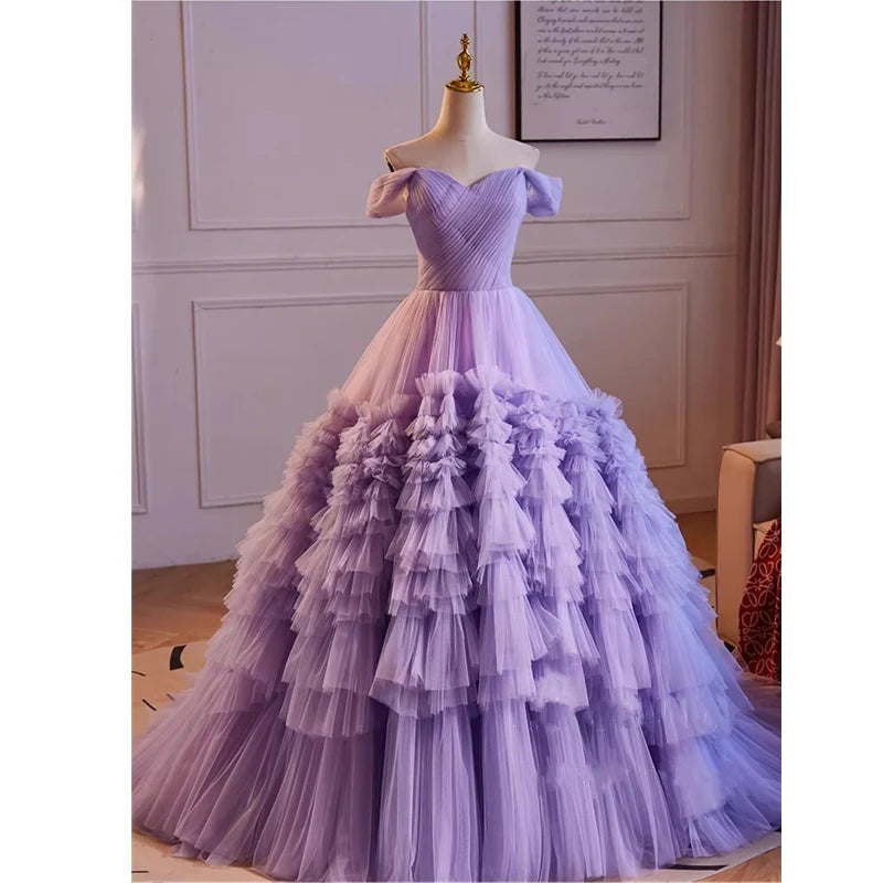 Elegant Off-shoulder Tulle Ball Gown With Ruffled Layers