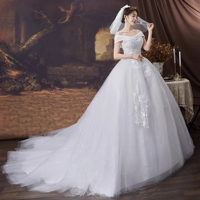 Elegant Off-shoulder Bridal Gown With Lace Detailing