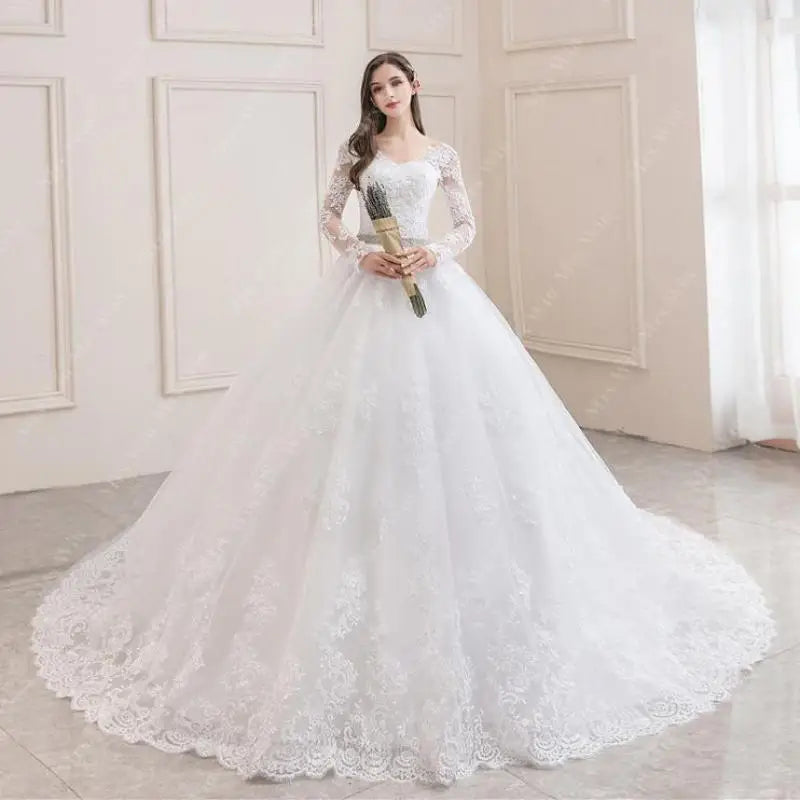 Elegant Long Sleeve Lace Bridal Gown With Train on Luulla