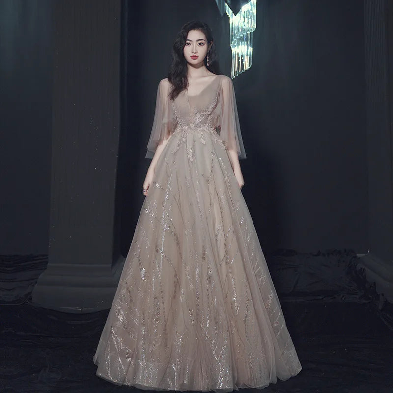 Elegant Beaded Tulle Evening Gown With Sheer Sleeves