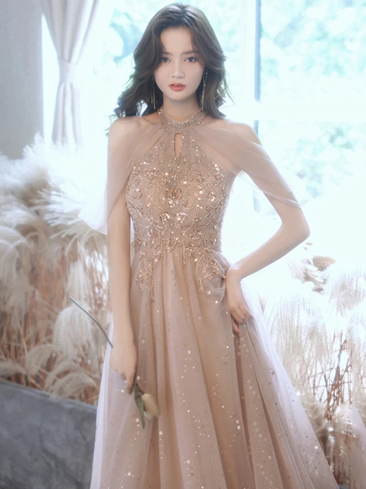 Elegant Beaded Long Evening Gown with Sheer Overlay