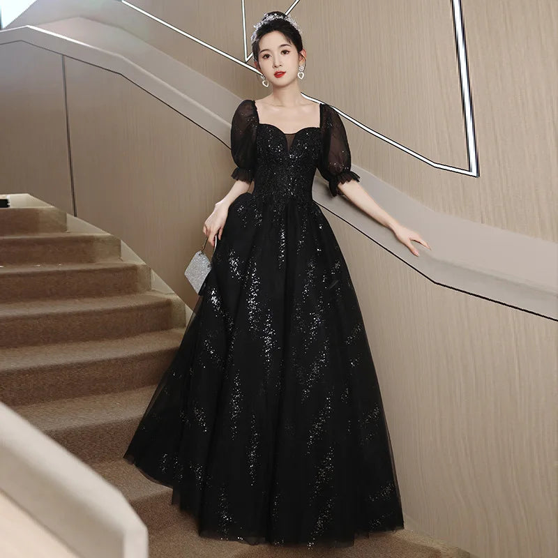 Elegant Black Sequin Evening Gown with Sheer Sleeves