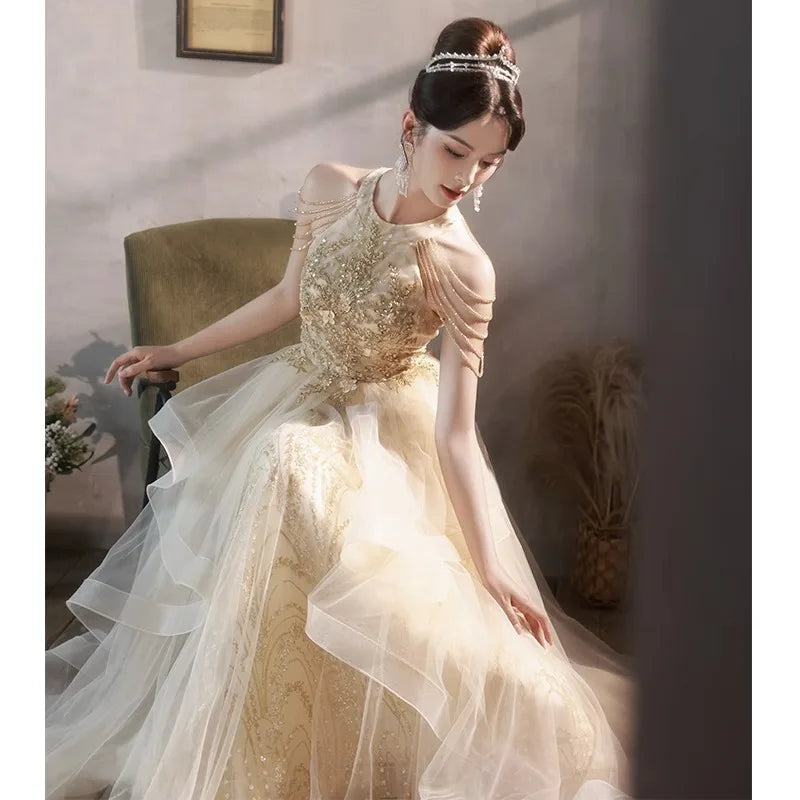 gold enchanted dress Enchanted Copper Lily Gown Teuta Matoshi