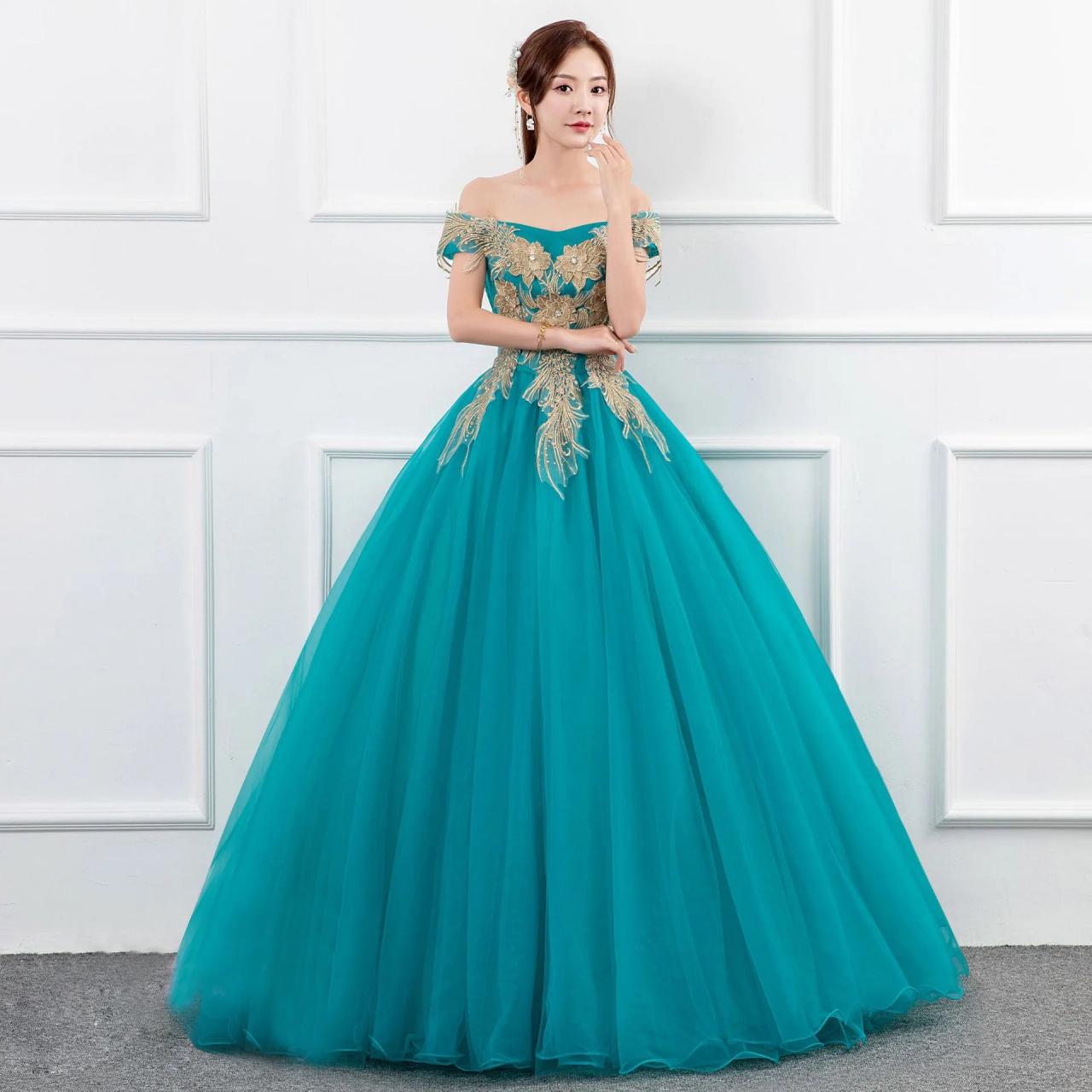 teal and gold dress Ordinia Gown in Blue Ibiza Night Teal