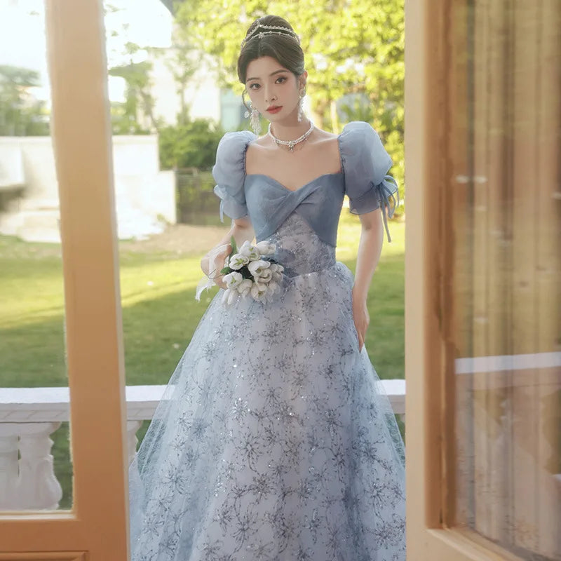Blue Puffy Sleeve Gown With Sequins And Bow