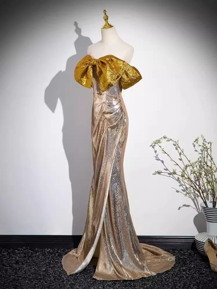 Gold Metallic Gown with Dramatic Bow Accent Gold Metallic Gown With Dramatic Bow Accent on Luulla