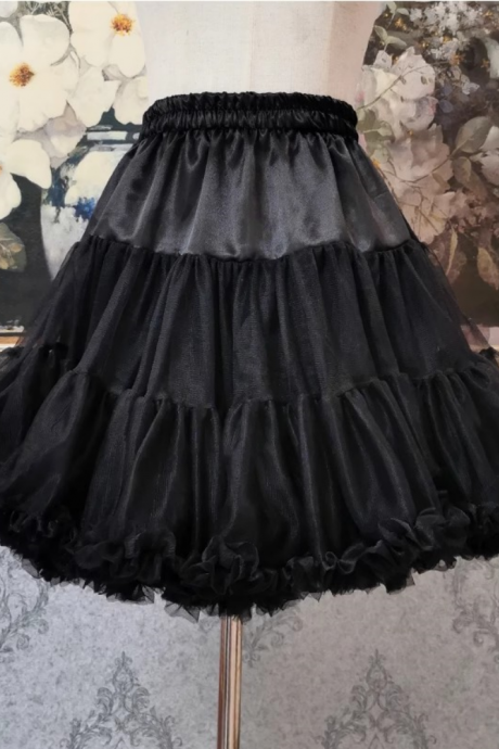 50cm long black boneless skirt brace with adjustable elastic waistband that doesn't tie the legs