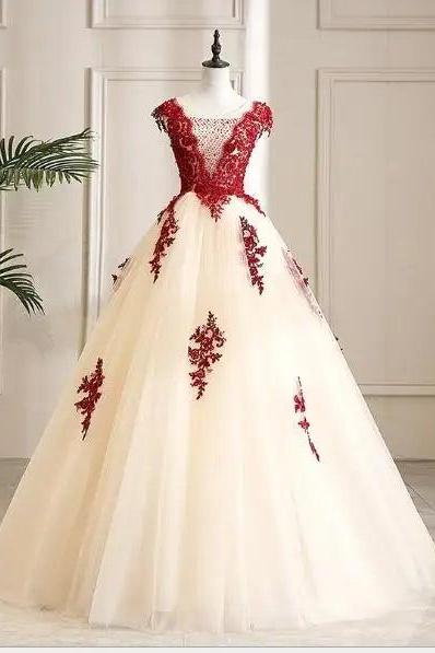 Elegant Sleeveless Tulle Gown With Red Appliqués