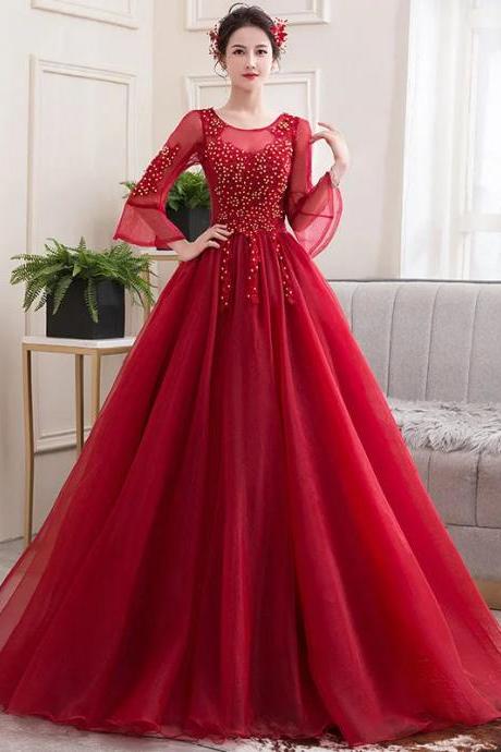 Elegant Red Beaded Ball Gown With Sheer Sleeves