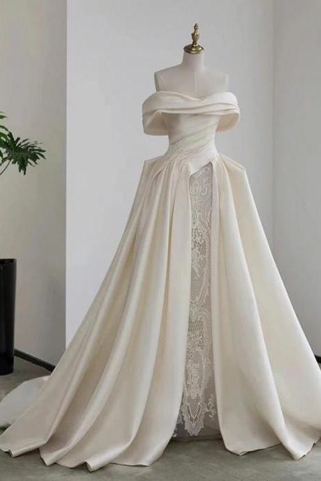 Elegant Off-shoulder Bridal Gown With Lace Inserts