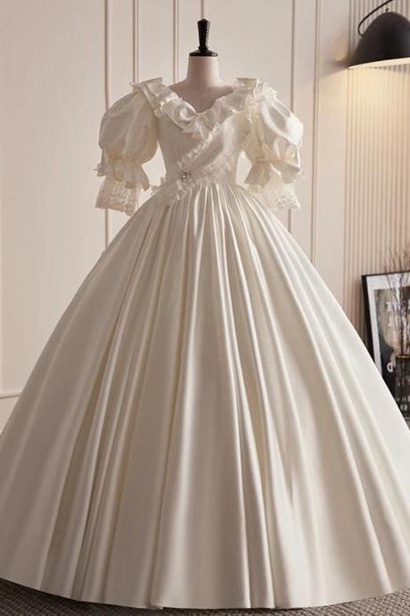 Elegant Satin Bridal Gown With Puff Sleeves And Embellishments