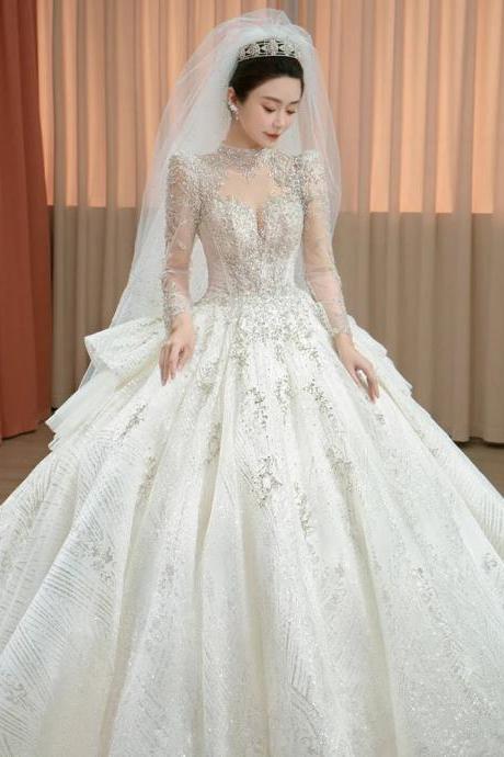Elegant Long-sleeve Beaded Ball Gown Wedding Dress