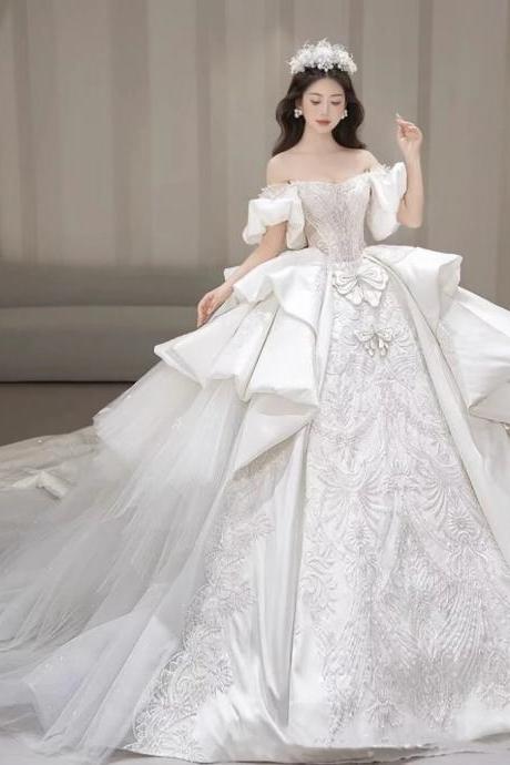 Elegant Off-shoulder Bridal Gown With Embroidered Details