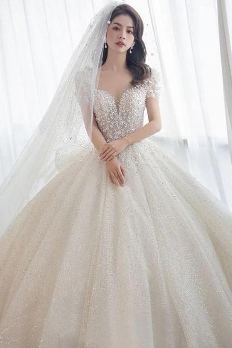 Elegant Off-shoulder Bridal Gown With Sparkling Beads