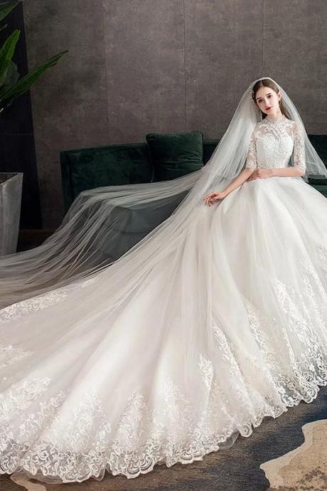 Elegant Long-sleeve Lace Wedding Gown With Veil
