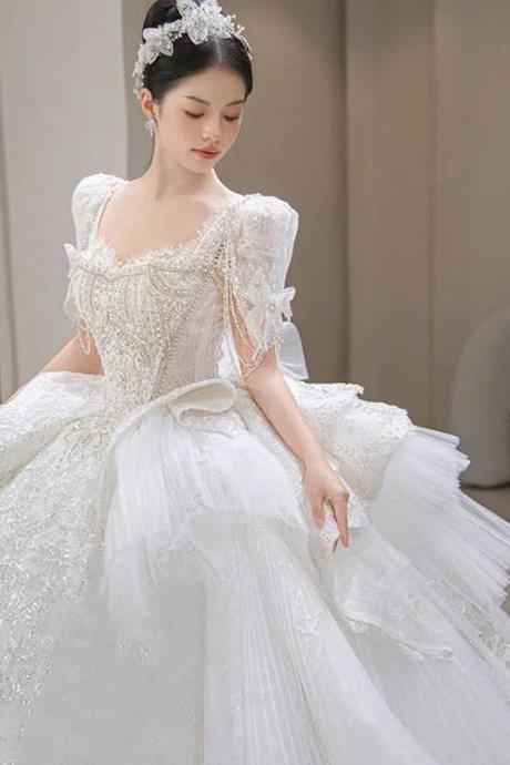 Elegant Off-shoulder Sequin Lace Bridal Gown With Train