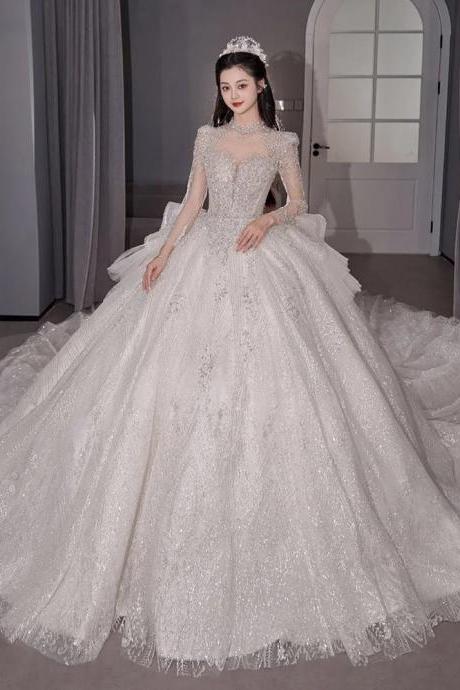 Luxurious Beaded Long Train Bridal Gown With Sleeves