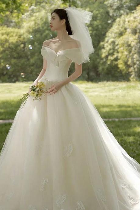 Elegant Off-shoulder A-line Wedding Dress With Train