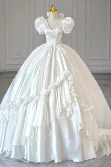 Elegant Puff Sleeve Bridal Gown With Ruffled Skirt