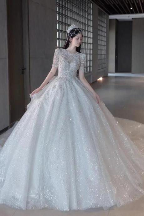 Elegant Beaded Bodice Bridal Gown With Full Skirt