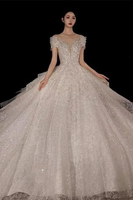 Elegant Off-shoulder Sparkling Tulle Bridal Ballgown