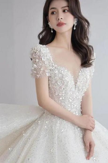 Elegant Sequined V-neck Bridal Gown With Cap Sleeves