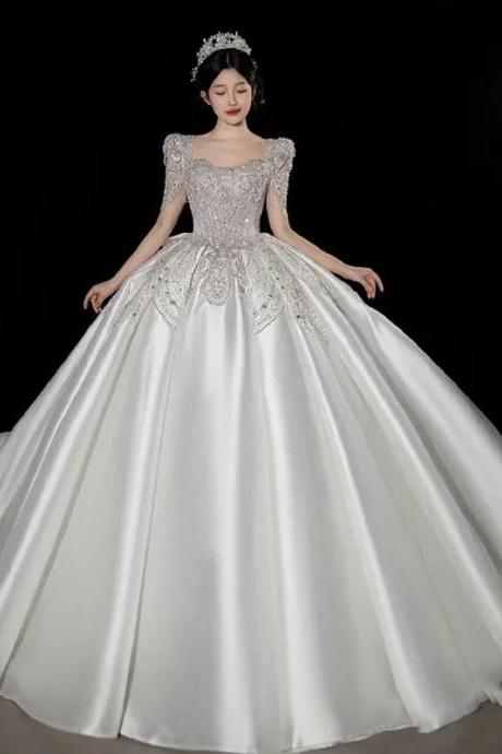 Elegant Off-shoulder Satin Bridal Gown With Beading