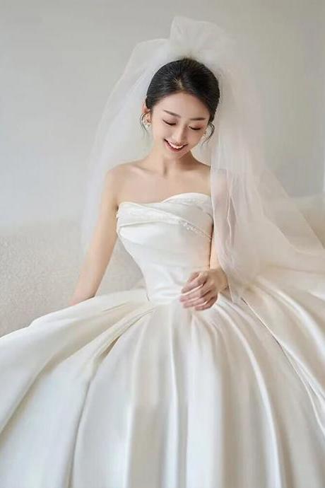 Elegant Strapless Satin Bridal Gown With Long Veil