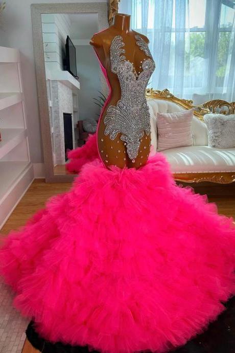 Luxurious Pink Feathered Ball Gown With Crystals