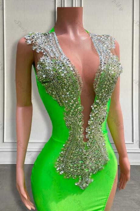 Elegant Green Sleeveless Dress With Crystal Embellishments