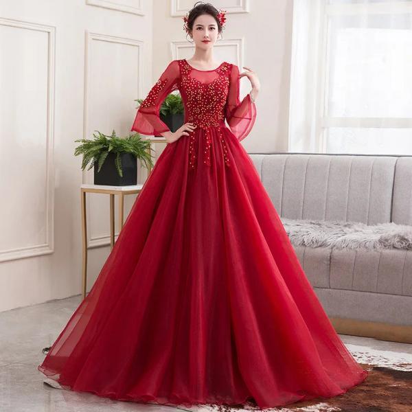 Elegant Red Beaded Ball Gown with Sheer Sleeves
