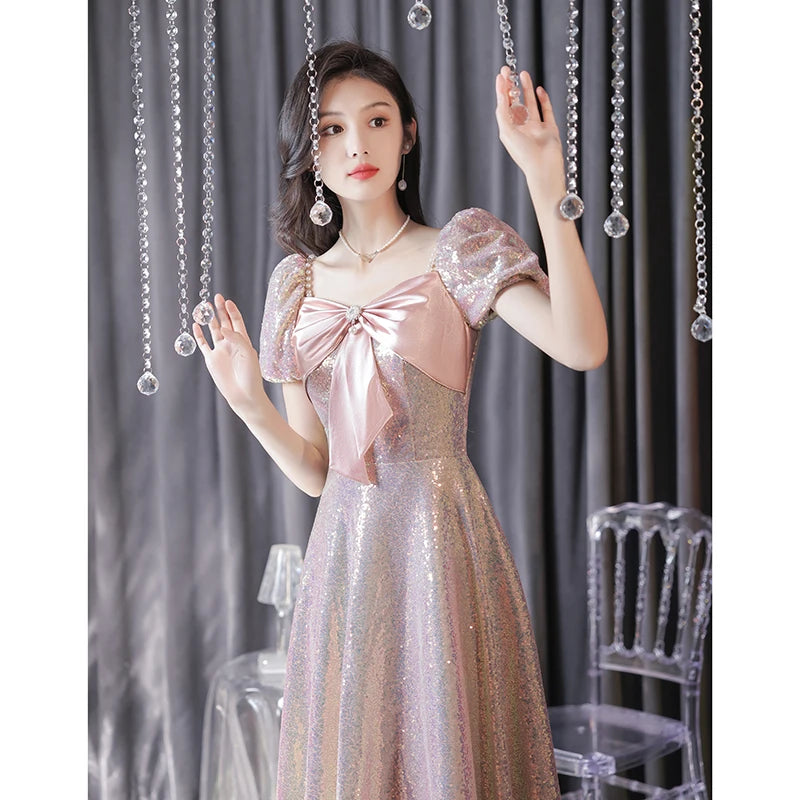 Elegant Sparkling Evening Gown With Satin Bow Accent on Luulla