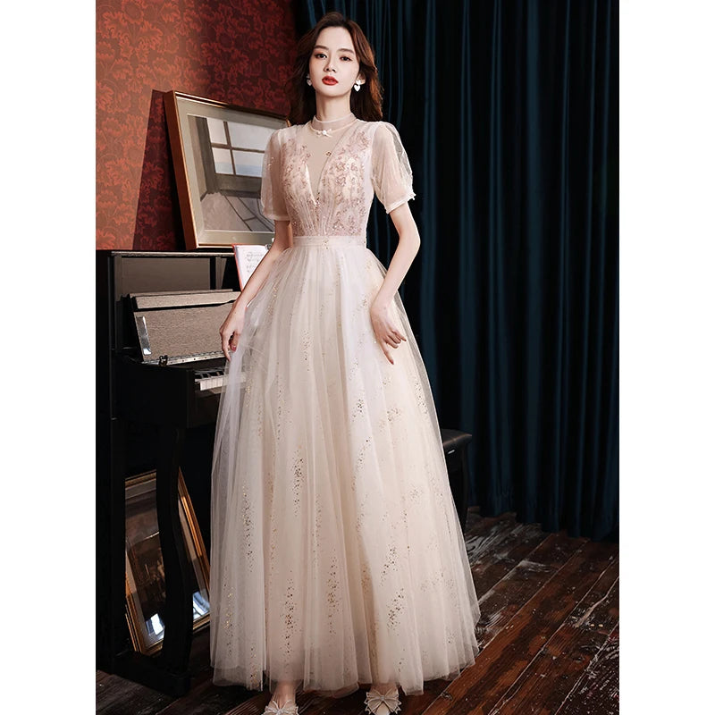 Elegant Beige Tulle Embroidered Evening Gown With Sleeves on Luulla